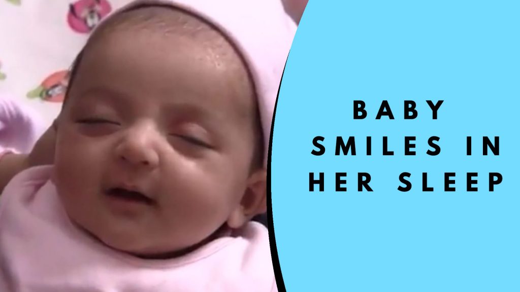 funny_baby_smiling_in_her_sleep